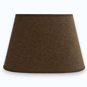 Brauner Lampenschirm aus echtem Leinen in ovaler Form, freigestellte Frontansicht mit gewebter Struktur, oben 23 cm, unten 35 cm, Höhe 22 cm, Light & Living, Artikelnummer 32435-1781